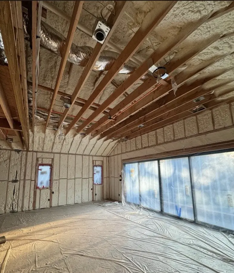 Interior walls and ceiling insulated with spray foam during new construction in Beach Park